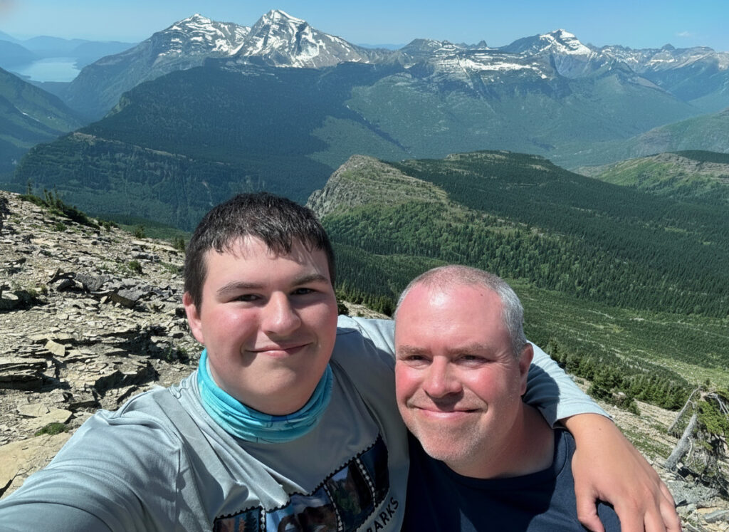 Stay-at-home dad and financial expert Tony with his son, illustrating the real-world focus of Monthly Money