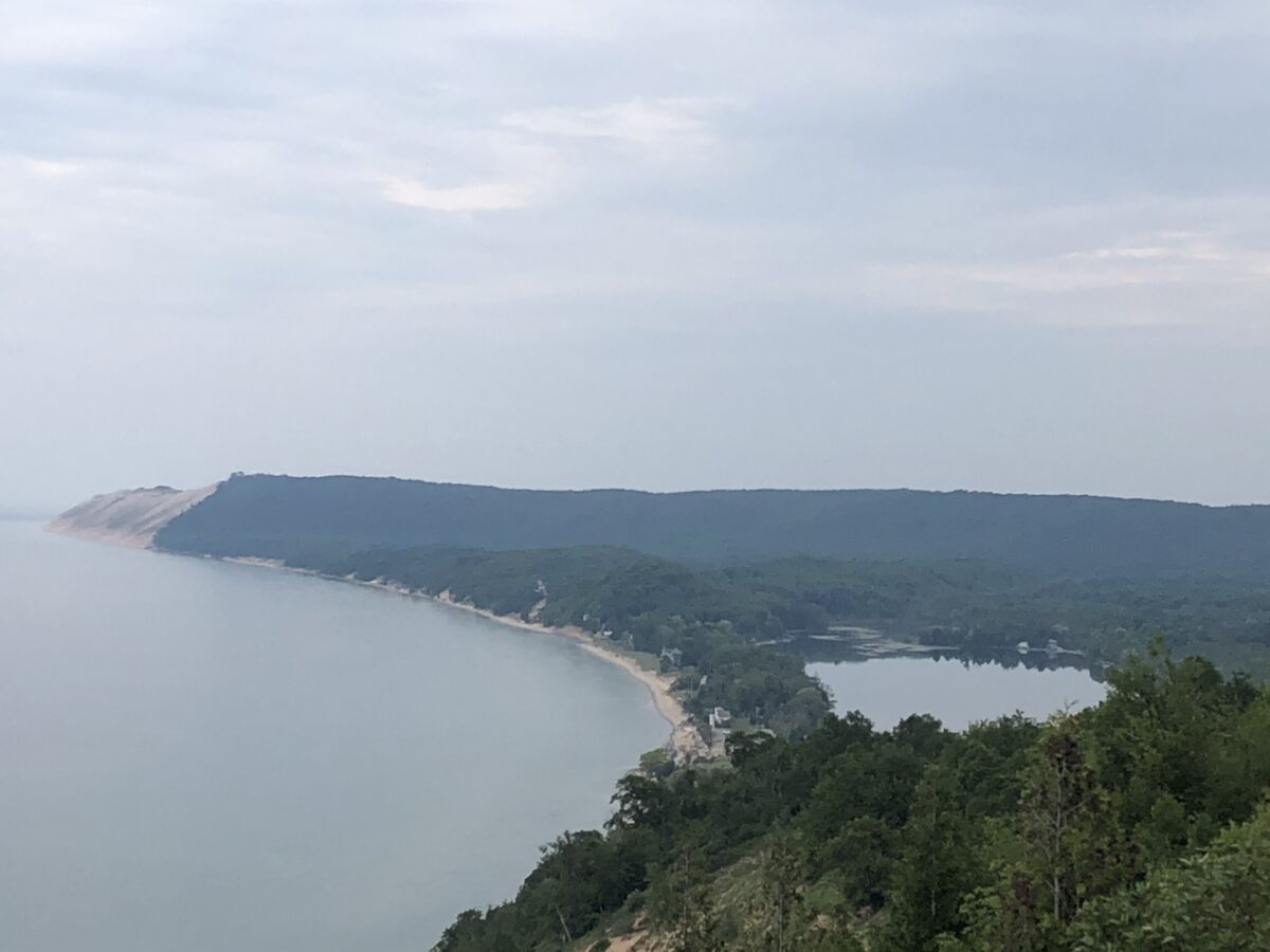 Aerial view of Sleeping Bear Dunes and Lake Michigan shoreline on a summer day